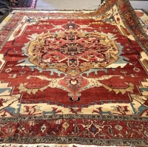 Deep terracotta, beige , ivory, and beige with subtle accents in soft pink and pale blue