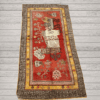 A richly detailed antique Khotan rug Samarkand vase design with a deep red field, intricate vase motifs, and a distinctive Chinese-inspired border. Bold, layered, and highly decorative, 4'0" x 8'6"