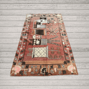 A striking antique Khotan rug with a vibrant red-orange field and a sequence of stylized vases. Bold yet refined, this piece blends geometric structure with expressive botanical forms, 4'6" x 7'10"