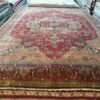 A modern Heriz rug handmade in Turkey, blending bold structure with refined color. A modern statement piece with timeless roots, 9'x12'