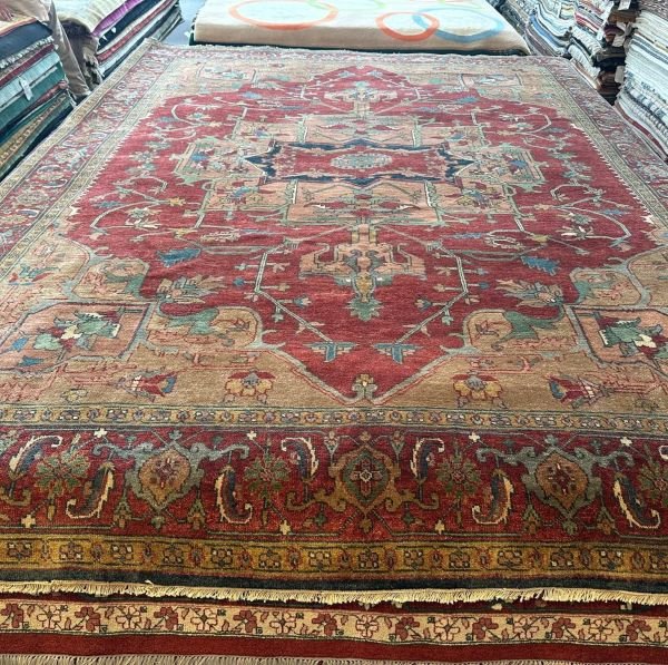 A modern Heriz rug handmade in Turkey, blending bold structure with refined color. A modern statement piece with timeless roots, 9'x12'