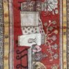 A richly detailed antique Khotan rug Samarkand vase design with a deep red field, intricate vase motifs, and a distinctive Chinese-inspired border. Bold, layered, and highly decorative, 4'0" x 8'6"