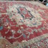 A modern Heriz rug handmade in Turkey, blending bold structure with refined color. A modern statement piece with timeless roots, 9'x12'