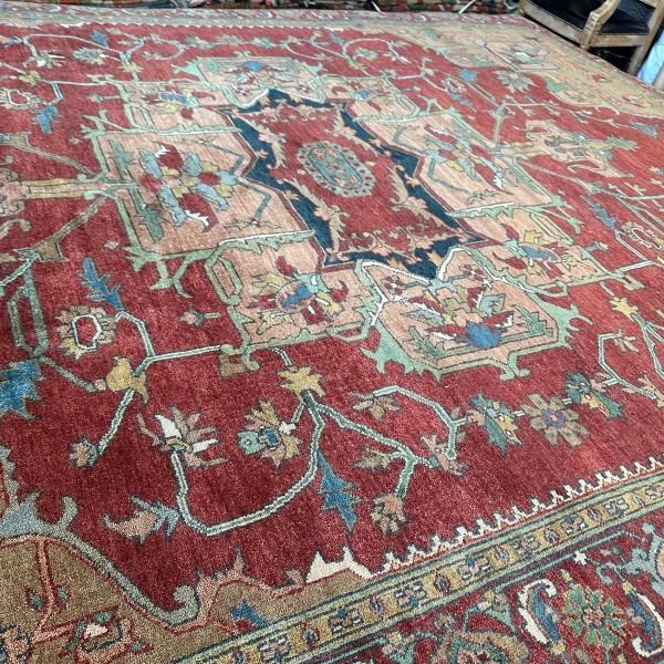 A modern Heriz rug handmade in Turkey, blending bold structure with refined color. A modern statement piece with timeless roots, 9'x12'