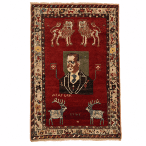 An exceptional and highly collectible pictorial vintage Turkish rug from Sivas, dated 1949, featuring a rare and symbolic figural composition centered around Mustafa Kemal Atatürk, the founder of modern Turkey.