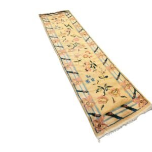 A charming and distinctive floral vintage Turkish runner from the 1960s, showcasing a delightful interpretation of mid-century design through traditional weaving. This piece beautifully reflects the era’s shift toward lighter palettes and more playful, modern compositions, 2'6" x 9'2" 