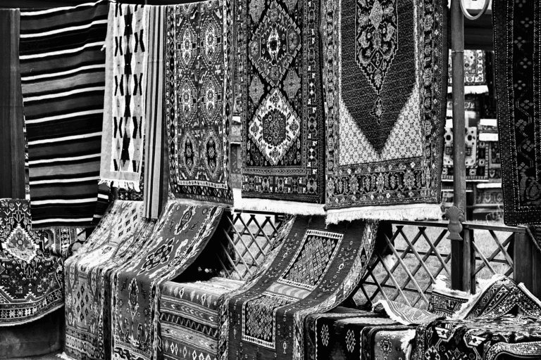 black and white picture of rugs with traditional pattern at the bazaar