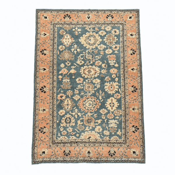 vintage sultanabad floral design 7x10 A beautifully balanced vintage Sultanabad-style rug featuring large-scale floral motifs on a soft green-blue field with a warm beige-peach border, 7'3" x 9'6"
