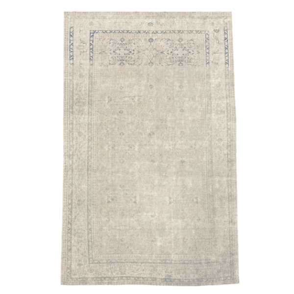 A softly antique washed rug from Sivas featuring delicate allover floral motifs in ivory and light blue. Elegant, understated, and timeless 6'4" x 9'6"