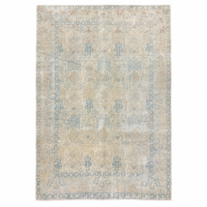An elegant antique Tabriz rug with an ivory base and delicate blue floral motifs arranged in a refined allover design. The antique-washed finish has beautifully softened the palette, creating a light and understated appearance, 7'4" x 10'7"