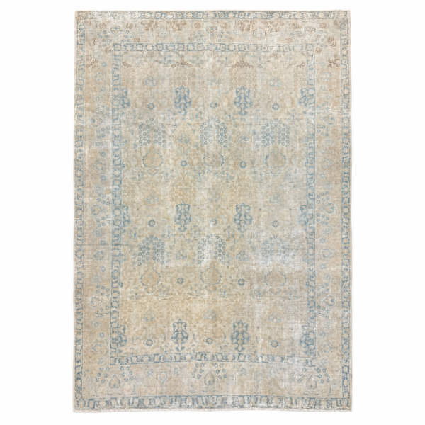 An elegant antique Tabriz rug with an ivory base and delicate blue floral motifs arranged in a refined allover design. The antique-washed finish has beautifully softened the palette, creating a light and understated appearance, 7'4" x 10'7"