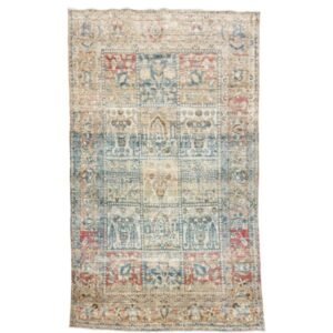 A distinctive antique botanical rug featuring an unusual tile-like composition filled with stylized botanical motifs. An ivory-beige ground is decorated with blue and red plants, trees, and flowers, beautifully softened by an antique wash, 4'3" x 6'5"